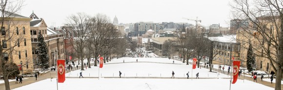 View from the top of a snow-covered Bascom Hill looking down to State Street