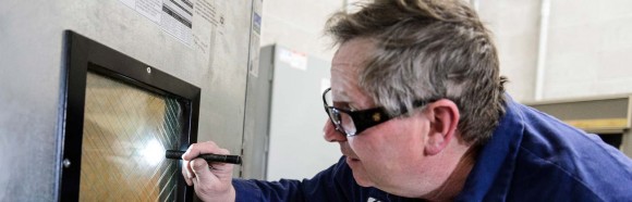 David Wilson, HVAC and refrigeration specialist for University Housing Residence Halls Facilities, performs one of several mechanical-room maintenance checks at Chadbourne Residence Hall at the University of Wisconsin-Madison on March 20, 2018. Wilson is one of eight recipients of a 2018 University Staff Recognition Award (USRA).