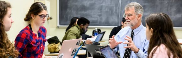 Patrick Remington, professor of population health sciences and associate dean in the School of Medicine and Public Health, participates in a group discussion while teaching an honors seminar in Van Hise Hall at the University of Wisconsin-Madison on Feb. 19, 2019. Remington is one of ten 2019 Distinguished Teaching Award recipients.