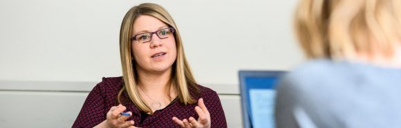 Kristin Shutts, associate professor of psychology at the University of Wisconsin-Madison, talks with a group of graduate students during a lab meeting in the Brogden Psychology Building on Feb. 20, 2019. Shutts is a recipient of a 2019 Distinguished Teaching Award.