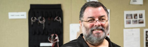 John Koger, research technology manager for the Center for Healthy Minds, is pictured at the Center for Healthy Minds at the University of Wisconsin–Madison on April 5, 2022. Koger is one of eleven recipients of a 2022 Academic Staff Excellence Award (ASEA).