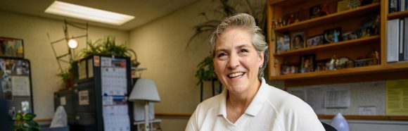 Kristine Schultz, department administrator in the Anthropology Department, poses for a portrait in the William H. Sewell Social Sciences Building at the University of Wisconsin-Madison on June 20, 2023. Schultz is one of ten recipients of the 2023 University Staff Recognition Award.