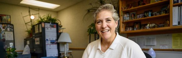 Kristine Schultz, department administrator in the Anthropology Department, poses for a portrait in the William H. Sewell Social Sciences Building at the University of Wisconsin-Madison on June 20, 2023. Schultz is one of ten recipients of the 2023 University Staff Recognition Award.